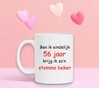 foto 4 Ben ik eindelijk 56 jaar krijg ik zo'n stomme beker
