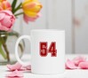 foto 4 Mok met getal 54 als opdruk