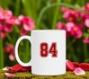 foto 2 Mok wit met als opdruk het getal 84