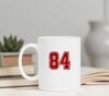 foto 4 Mok wit met als opdruk het getal 84