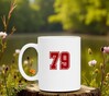 foto 3 Wiite koffiemok met het getal 79 erop gedrukt