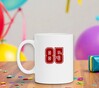 foto 4 Witte koffiebeker met het getal 85 als opdruk mok wit