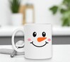 foto 2 Koffiemok met de print van een verlegen sneeuwpop